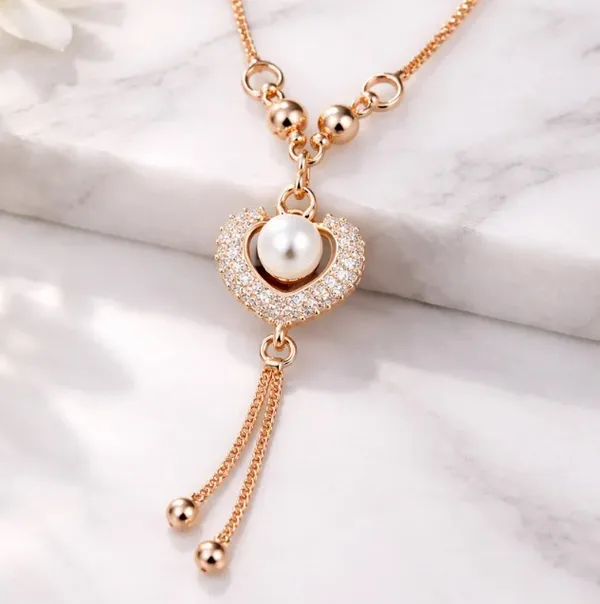 Rose_Gold_Heart_Pendant_Necklace_With_Pearl_And_Crystal_Accents