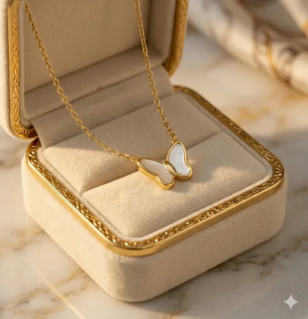 Elegant_Butterfly_Pendant_Necklace_White_Enamel_And_Gold_Chain