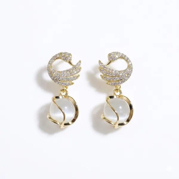 Elegant_Gold_Toned_Swan_Drop_Earrings_With_Pearl_Accent