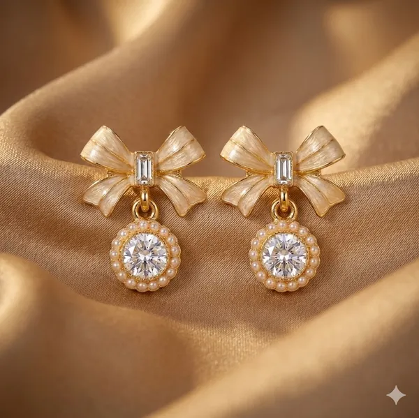 Gold_Toned_Bow_Drop_Earrings_With_Crystal_Accents