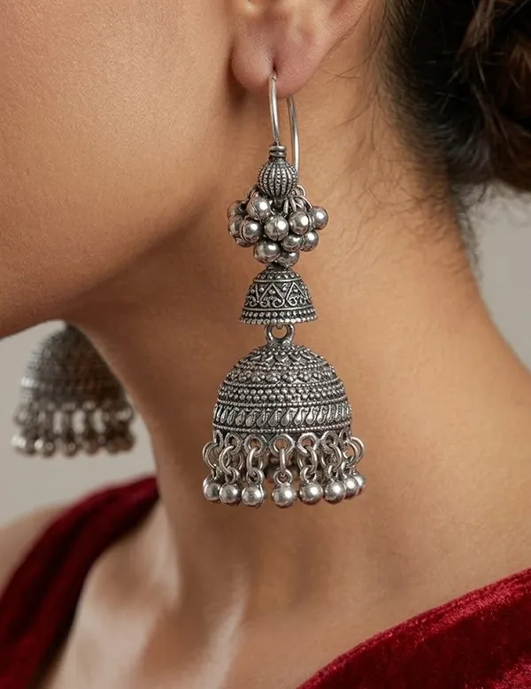 Oxidized_Silver_Jhumka_Earrings_With_Intricate_Tribal_Design