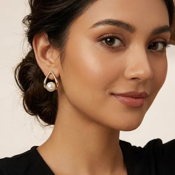 Gold_Toned_Pearl_Drop_Earrings_With_Teardrop_Frame_Design