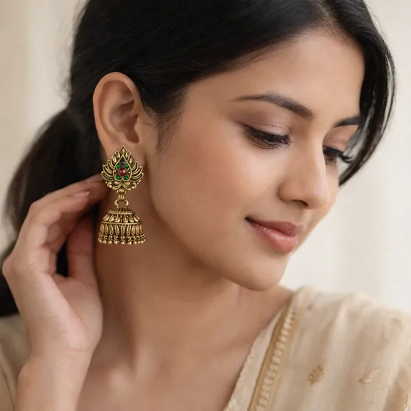Traditional_Gold_Toned_Jhumka_Earrings_With_Green_Stone
