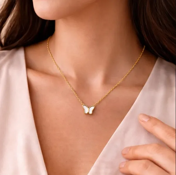 Elegant_Butterfly_Pendant_Necklace_White_Enamel_And_Gold_Chain