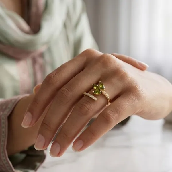 Yatiskar™_Emerald_Aura_Adjustable_Bow_Ring_–_18K_Gold_Plated_with_Pear-Cut_Zirconia