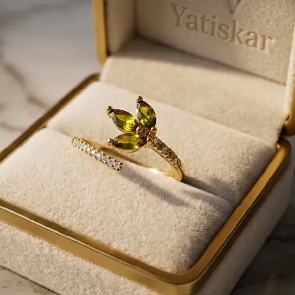 Yatiskar™_Emerald_Aura_Adjustable_Bow_Ring_–_18K_Gold_Plated_with_Pear-Cut_Zirconia