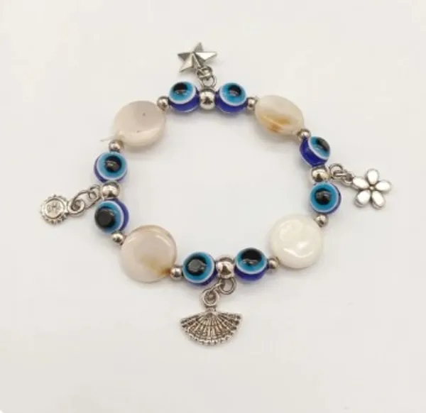 Evil_Eye_Protection_Bracelet_With_Mother_Of_Pearl_Beads_And_Silver_Charms