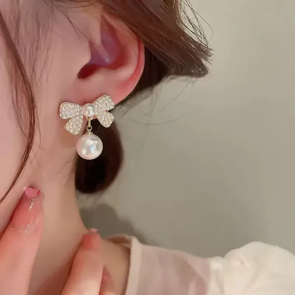 Pearl_Bow_Earrings_With_Dangling_Pearl_Drop