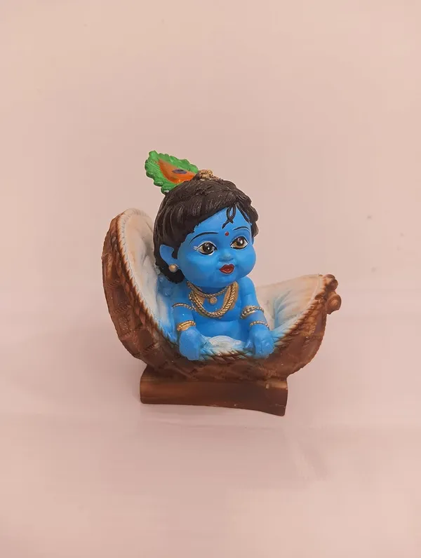 Blue_And_Orange_With_Gold_Accents_Baby_Krishna_Figurine_In_Basket