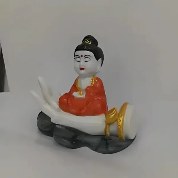 Orange_Buddha_On_Palm_Resin_Figurine