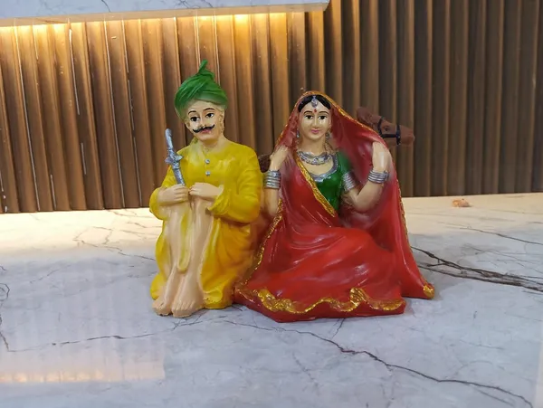 Multicolor_Rajasthani_Couple_With_Camel_Figurine_Showpiece