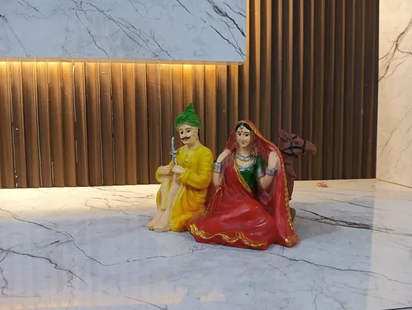 Multicolor_Rajasthani_Couple_With_Camel_Figurine_Showpiece