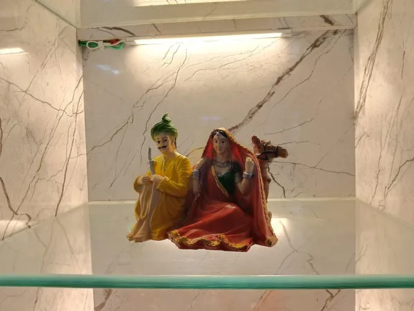 Multicolor_Rajasthani_Couple_With_Camel_Figurine_Showpiece