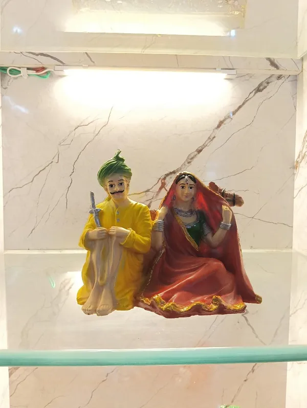 Multicolor_Rajasthani_Couple_With_Camel_Figurine_Showpiece