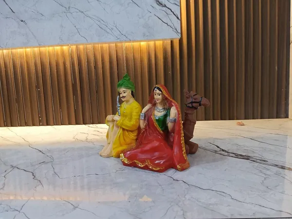Multicolor_Rajasthani_Couple_With_Camel_Figurine_Showpiece