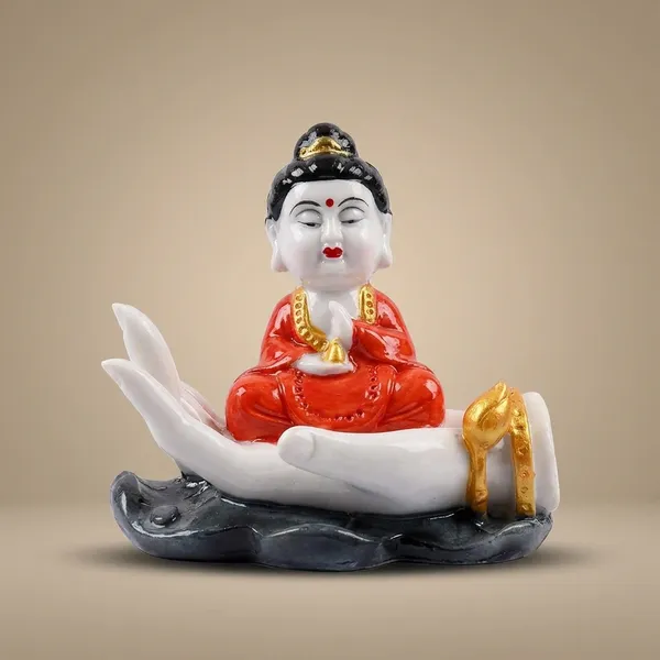 White_Buddha_Figurine_On_Palm