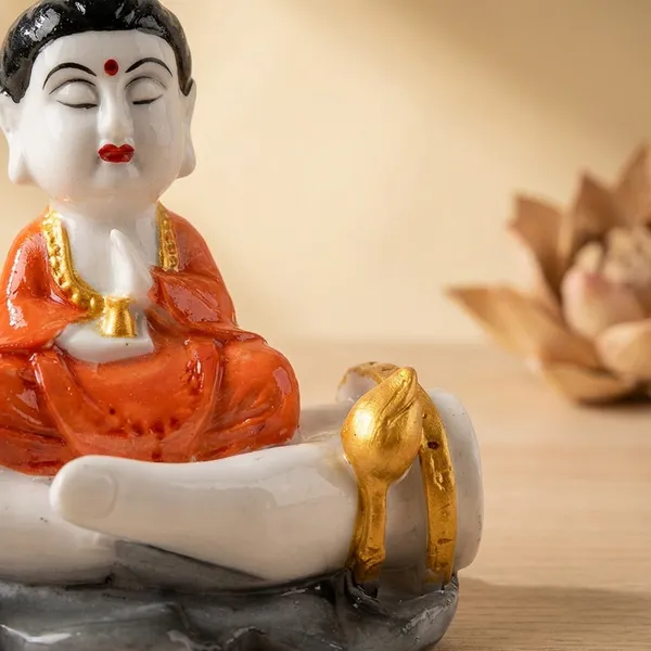 Multicolor_Buddha_Figurine_On_Palm_Resin_Showpiece