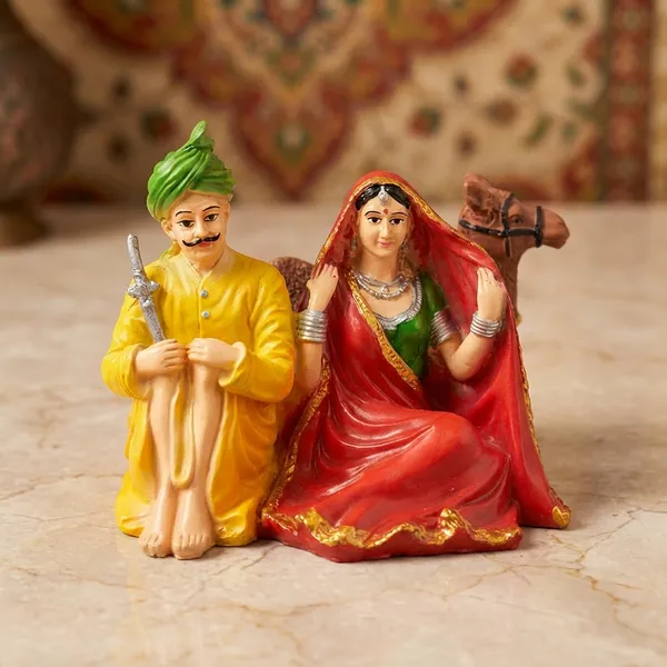 Multicolor_Rajasthani_Couple_With_Camel_Figurine_Showpiece