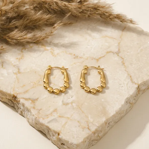 Golden_Beaded_Oval_Hoop_Pair_Of_Earrings