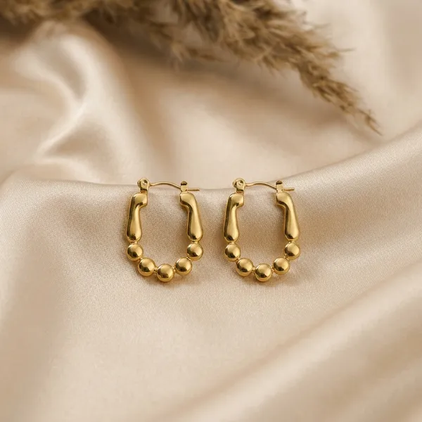Golden_Beaded_Oval_Hoop_Pair_Of_Earrings