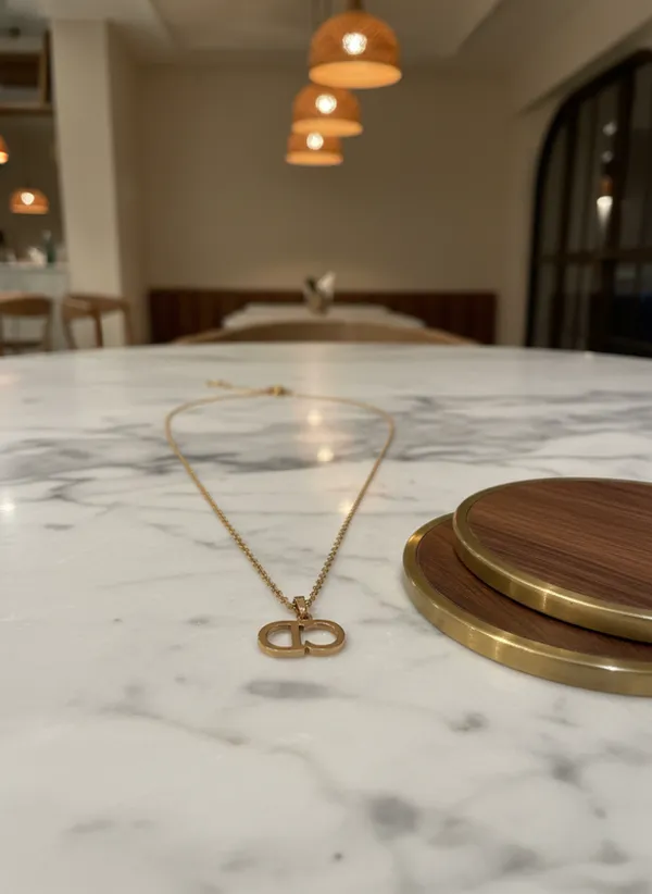 Elegant_Gold-Tone_Monogram_Pendant_Chain
