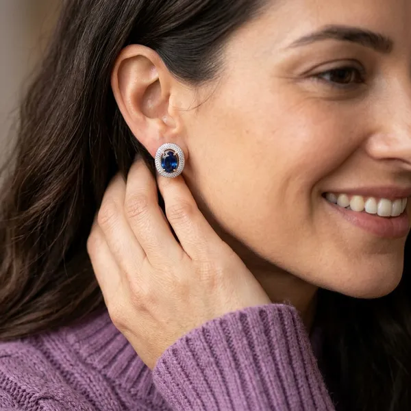 Elegant_Sapphire_Blue_Oval_Halo_Stud_Earrings_Shimmering_Crystal_Jewelry
