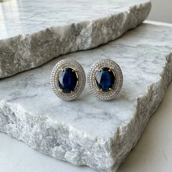 Elegant_Sapphire_Blue_Oval_Halo_Stud_Earrings_Shimmering_Crystal_Jewelry