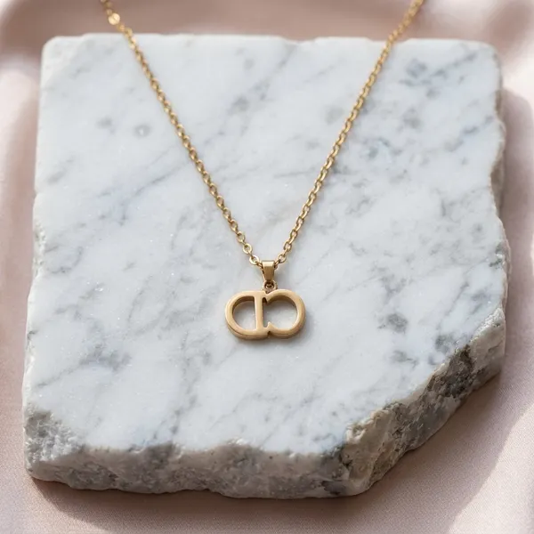 Elegant_Gold-Tone_Monogram_Pendant_Chain