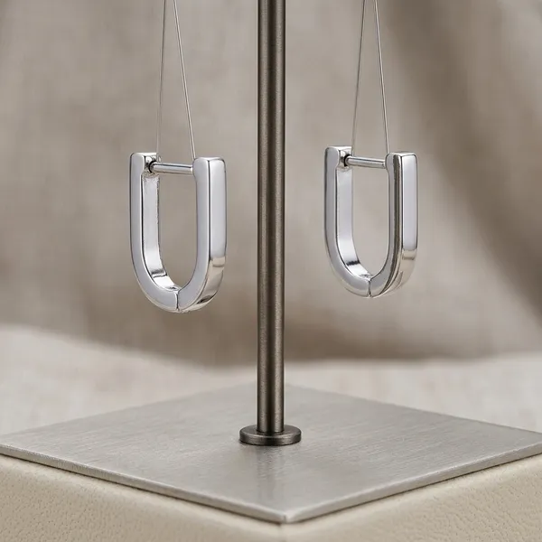 Minimalist_Sleek_Silver_U-Shape_Huggie_Pair_Of_Earrings