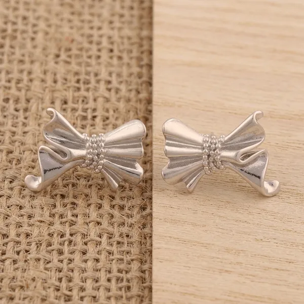 Sculptural_Silver_Bow_Earrings_Hoops