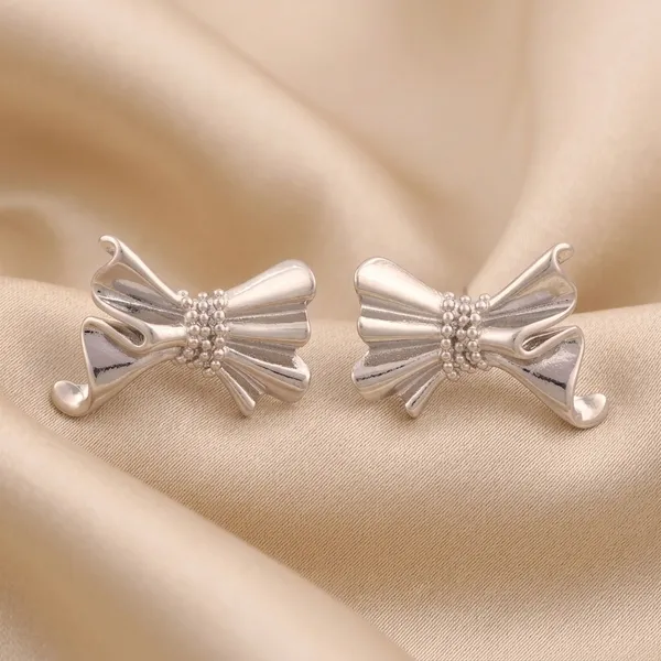 Sculptural_Silver_Bow_Earrings_Hoops