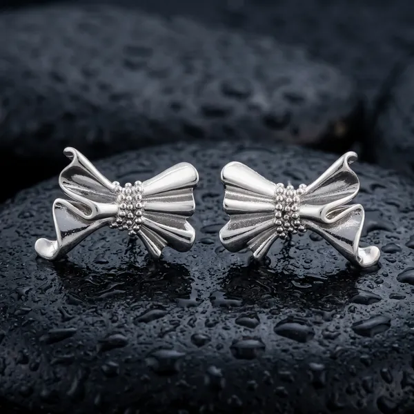 Sculptural_Silver_Bow_Earrings_Hoops
