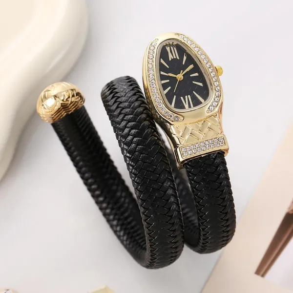 Serpentine_Gold_Tone_Crystal_Accented_Wrap_Bracelet_Watch
