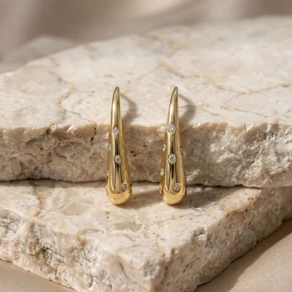 Stellar_Gilded_Drop_Earrings_With_Crystal_Accents