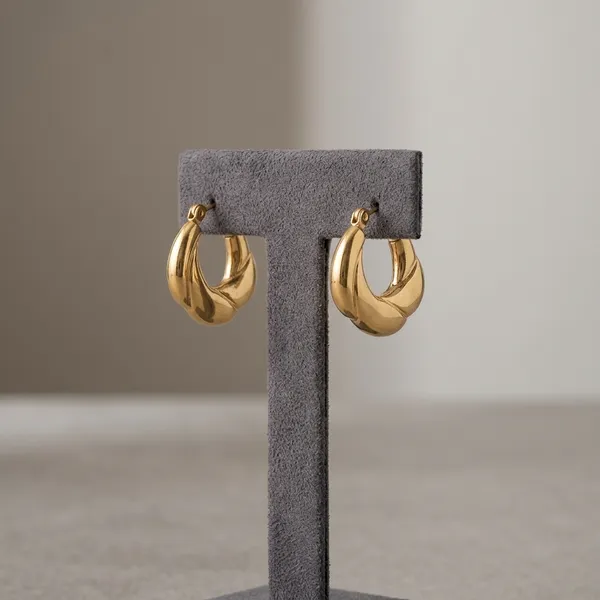 Elegant_Twisted_Gold_Hoop_Earrings