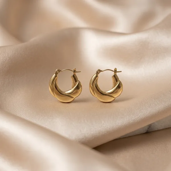 Elegant_Twisted_Gold_Hoop_Earrings