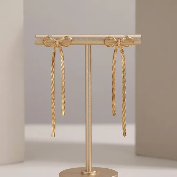 Gilded_Bow_Tassel_Earrings