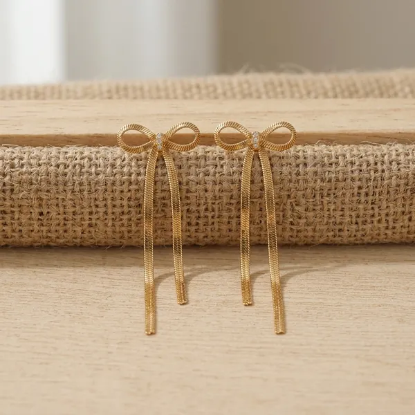 Gilded_Bow_Tassel_Earrings