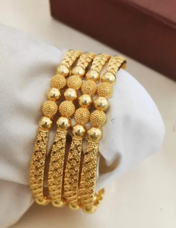 Royal_Textured_Gold_Plated_Patla_Bangles_–_Set_of_4_by_Anu_Fashion
