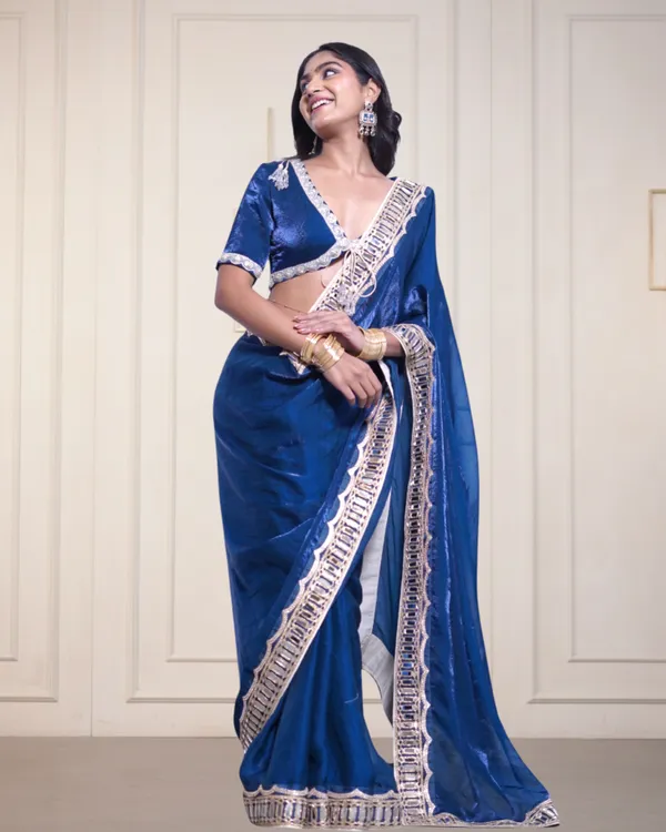 Royal_Blue_Silk_Saree_With_Embellished_Border_And_Matching_Blouse