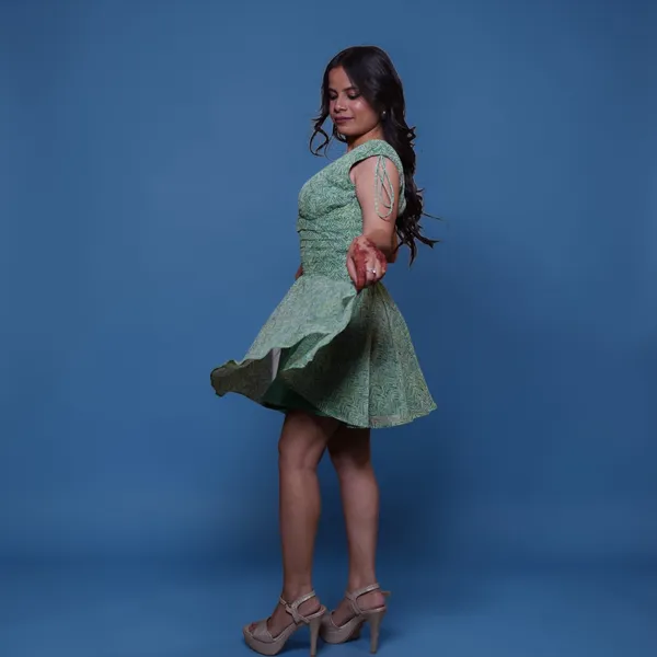 Green_Printed_Fit_And_Flare_Dress_With_Ruffle_Sleeves_And_Back_Tie-Up_Detail