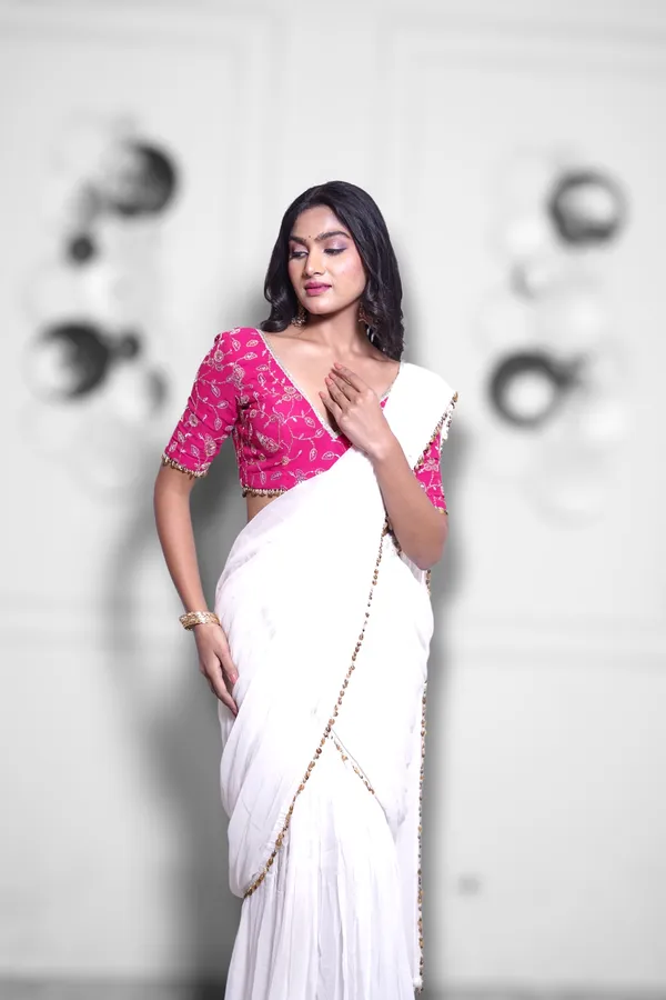 White_Georgette_Saree_With_Pink_Embroidered_Blouse