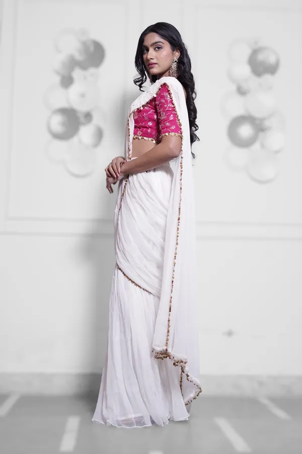 White_Georgette_Saree_With_Pink_Embroidered_Blouse