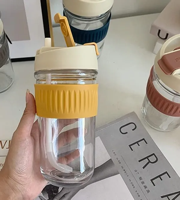 Dual_lid_Reusable_Portable_Leak_Proof_Coffee_Cup_with_Straw_&_Airtight_Lid,_High_Temperature_Resistance_Glass_Sipper_with_Silicone_Sleeve,_BPA_Free_Car_Travel_Mason_Jar_400_ML,_Yellow