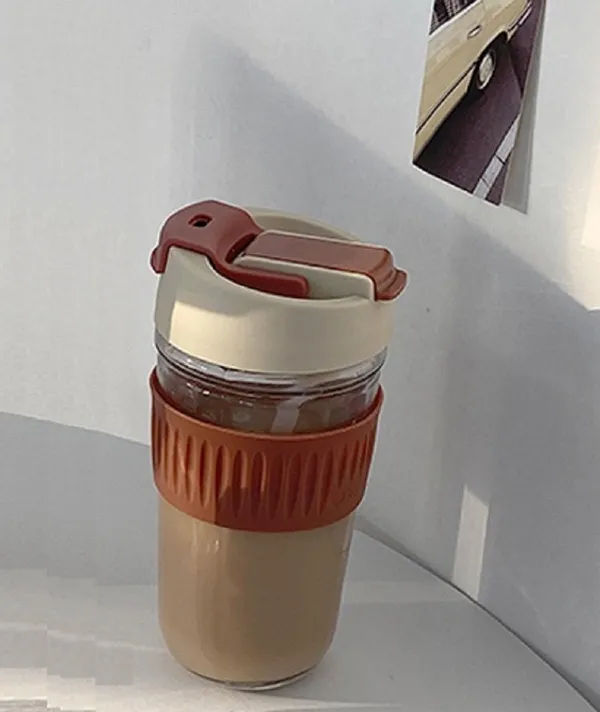 Dual_lid_Leak_Proof_Glass_Coffee_Cup_with_Straw_&_Leakproof_Lid,_Glass_Sipper_with_Silicone_Sleeve,_BPA_Free_Car_Travel_Mason_Jar_500_ML,_Brown
