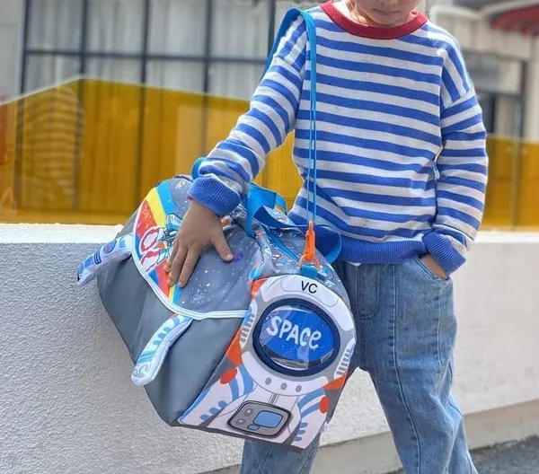 Space_Astronaut_Theme_Designer_Duffel_Handbag_&_Shoulder_Bag,_Weekender_Overnight_Bag,_Kids_&_Teenagers_Swimming_Duffle_Bag,_Large_-_18_x_8.4_x_9.4_Inches,_Blue