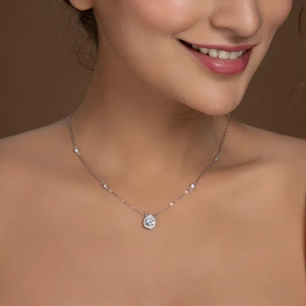 Elegant_Teardrop_Diamond_Pendant_Necklace_With_Halo_Design