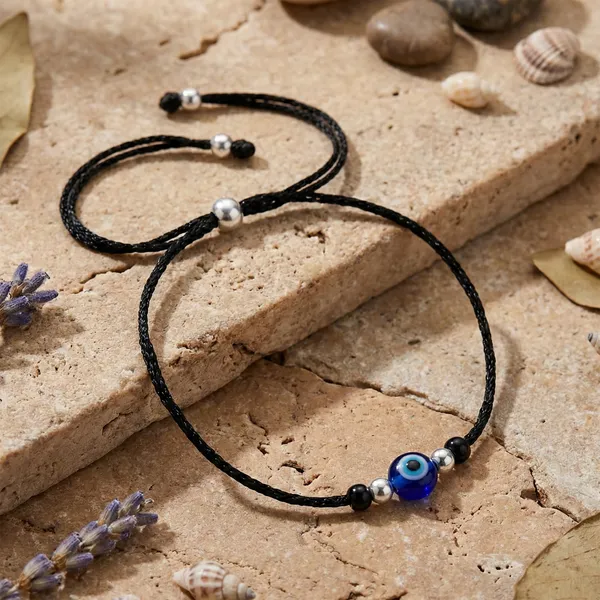 Blue_Evil_Eye_Protection_Bracelet_With_Adjustable_Black_Cord