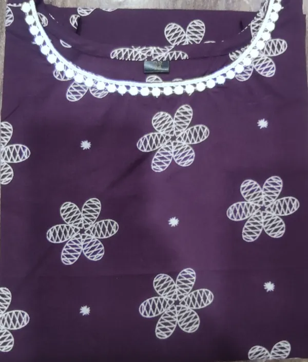 Purple_Floral_Embroidered_Sleeveless_Kurti_With_Pom_Pom_Neck_Detail