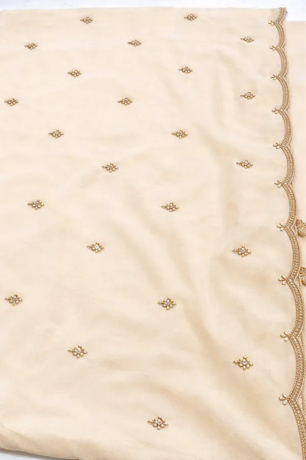 Elegant_Cream_Unstitched_Suit_Material_With_Golden_Embroidery_Work